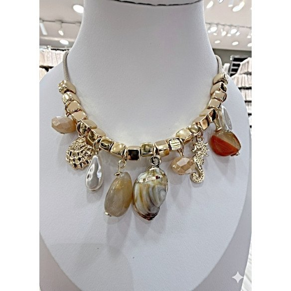 red-colored necklace with shells and seafood charms